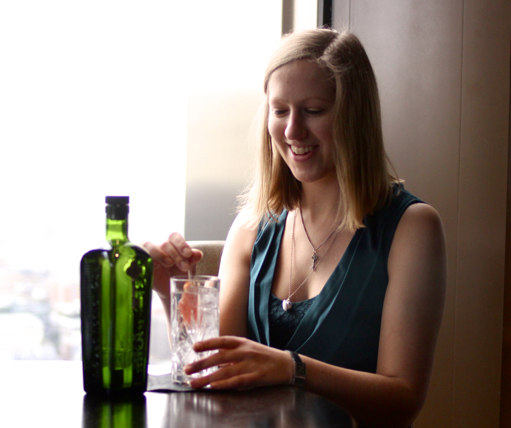 Amanda Baxter, happily stirring a G&T